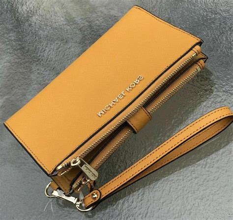 michael kors iphone 5s wallet|Michael Kors double zip wallet.